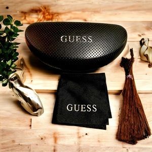 Guess sunglasses case and towelette’s